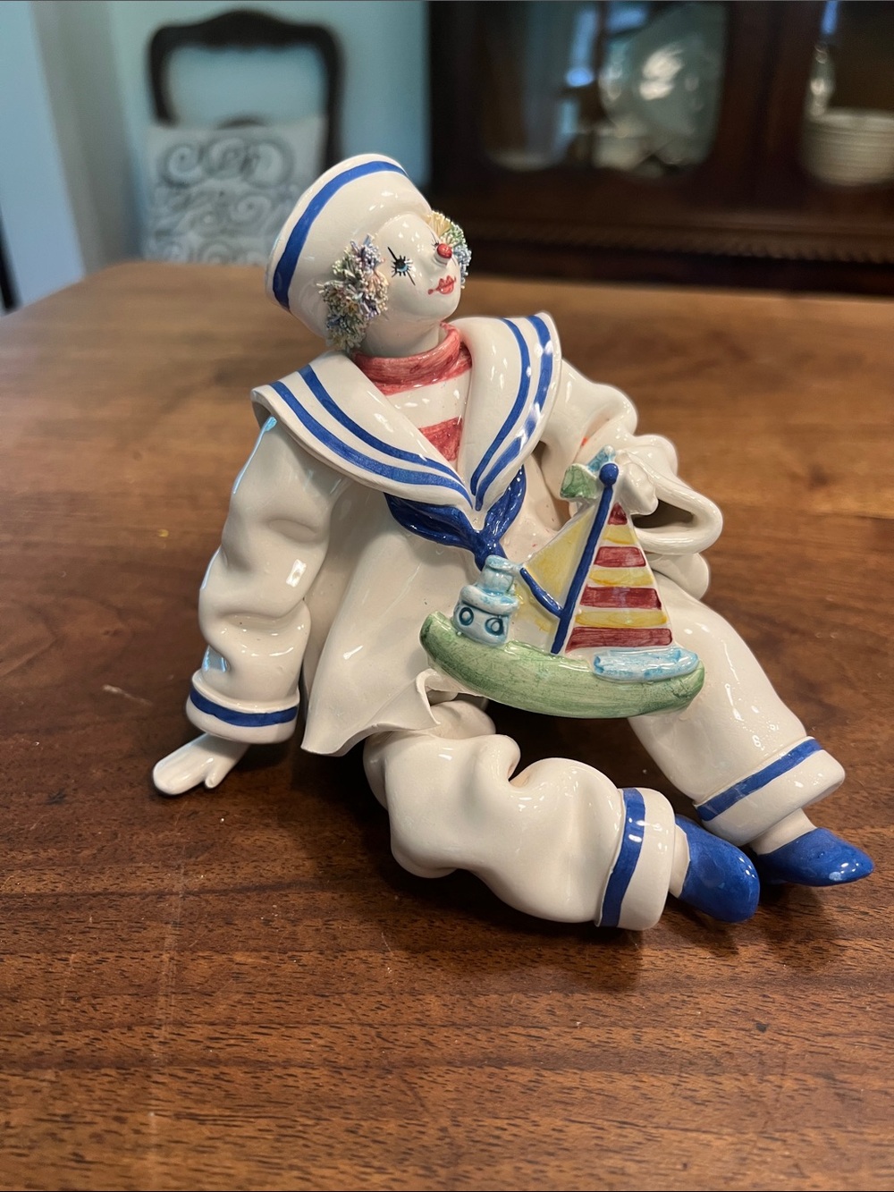 Gump’s Hand-Painted Porcelain Sailor Figurine in White & Blue with Boat